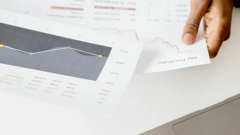 Document management software examples showing professional workspace with multiple digital platforms