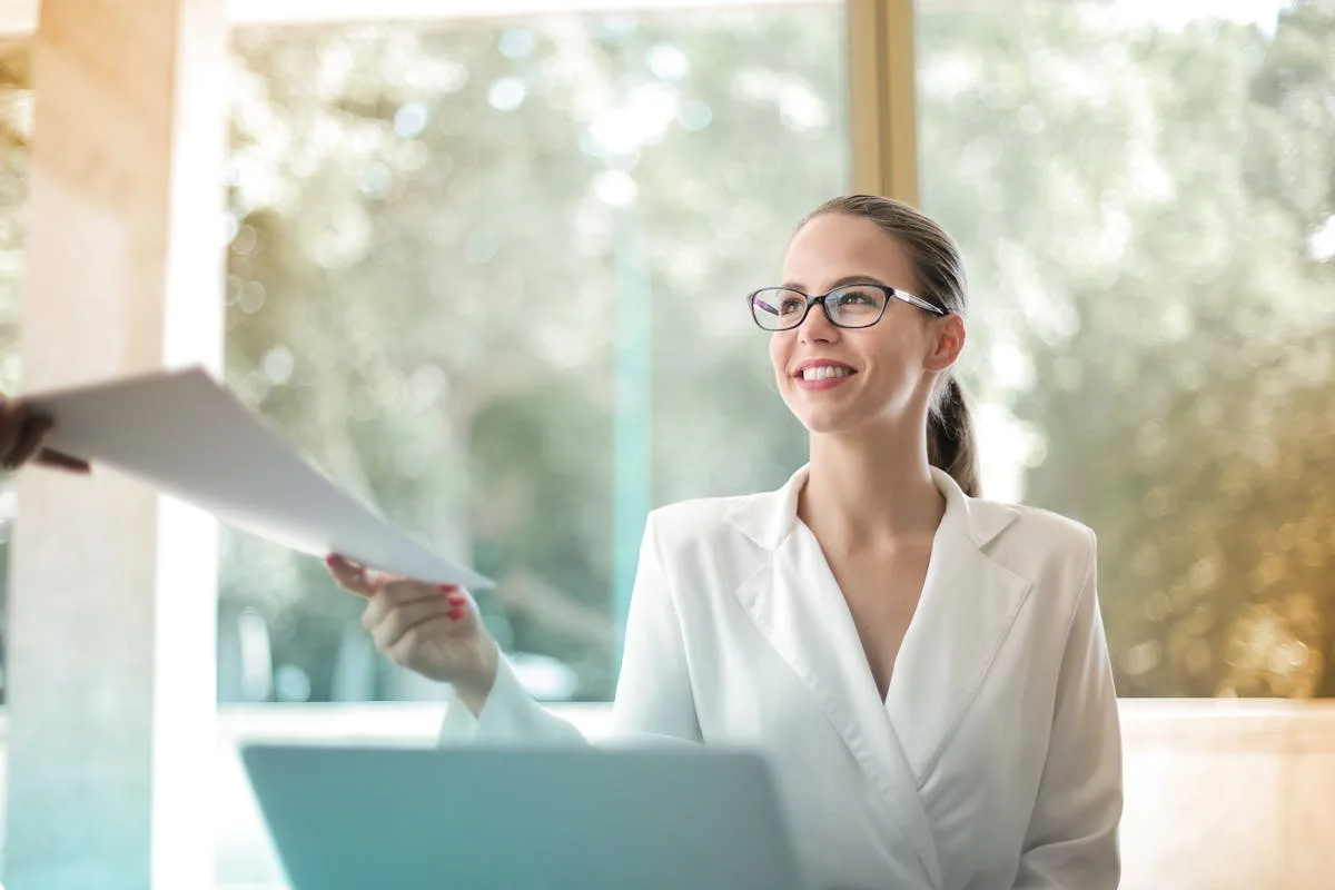 Insurance professional reviewing claims documents on a digital document management dashboard